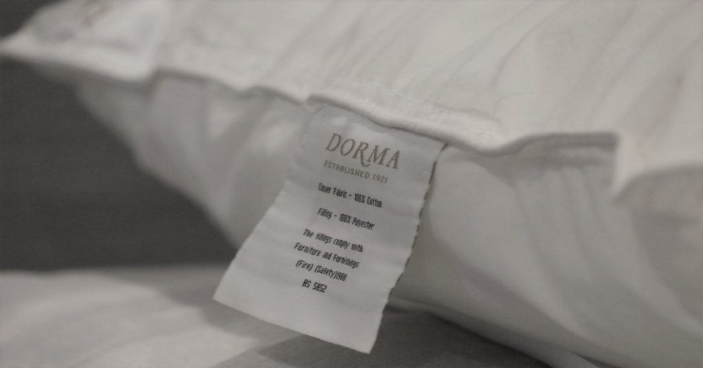 Why Do Pillows Have Tags? 🛏️ (We Find Out) Safe Sleep Systems